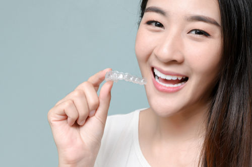 Westborough dentist | woman with invisalign